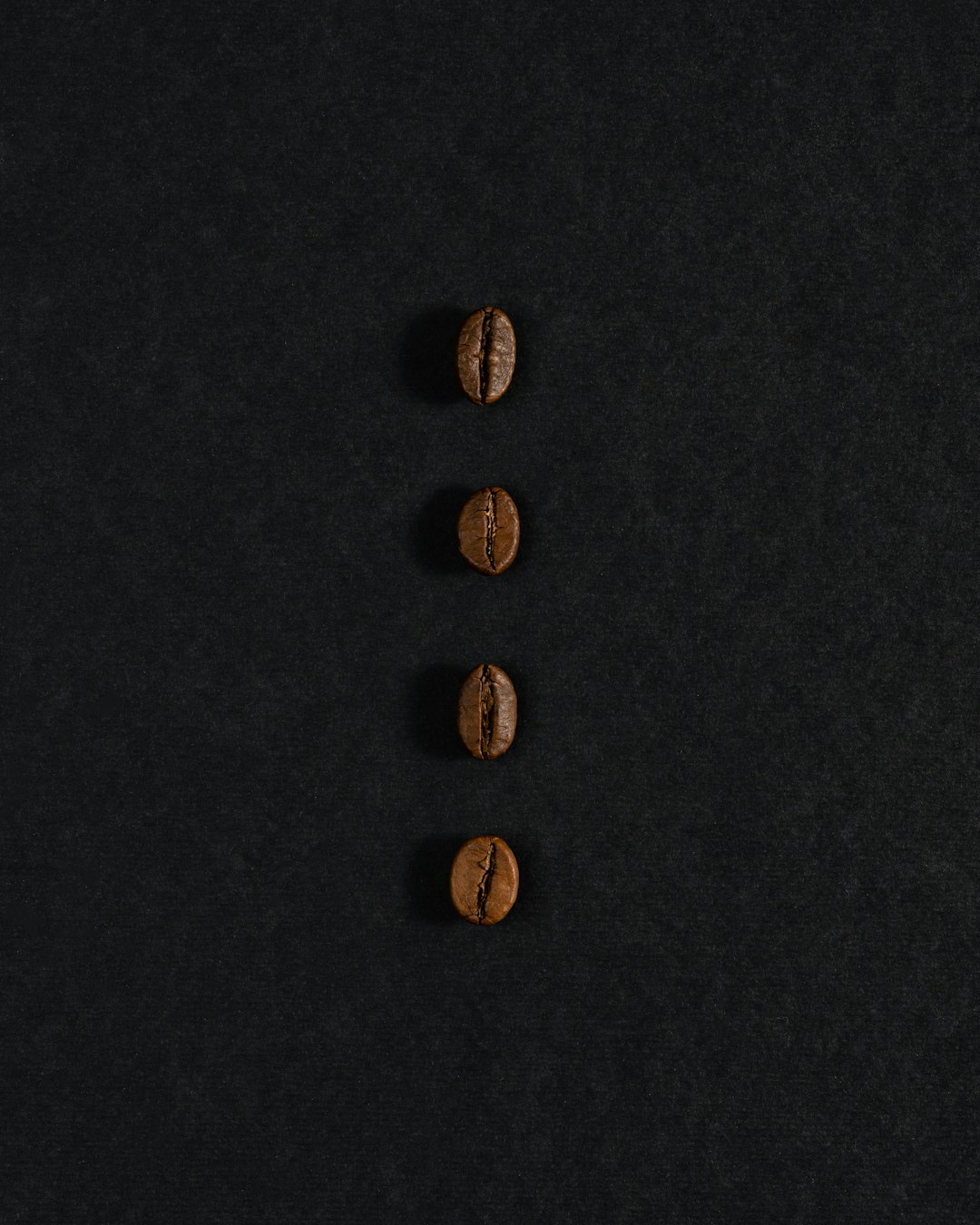 Macro shot of coffee beans showing texture and colour