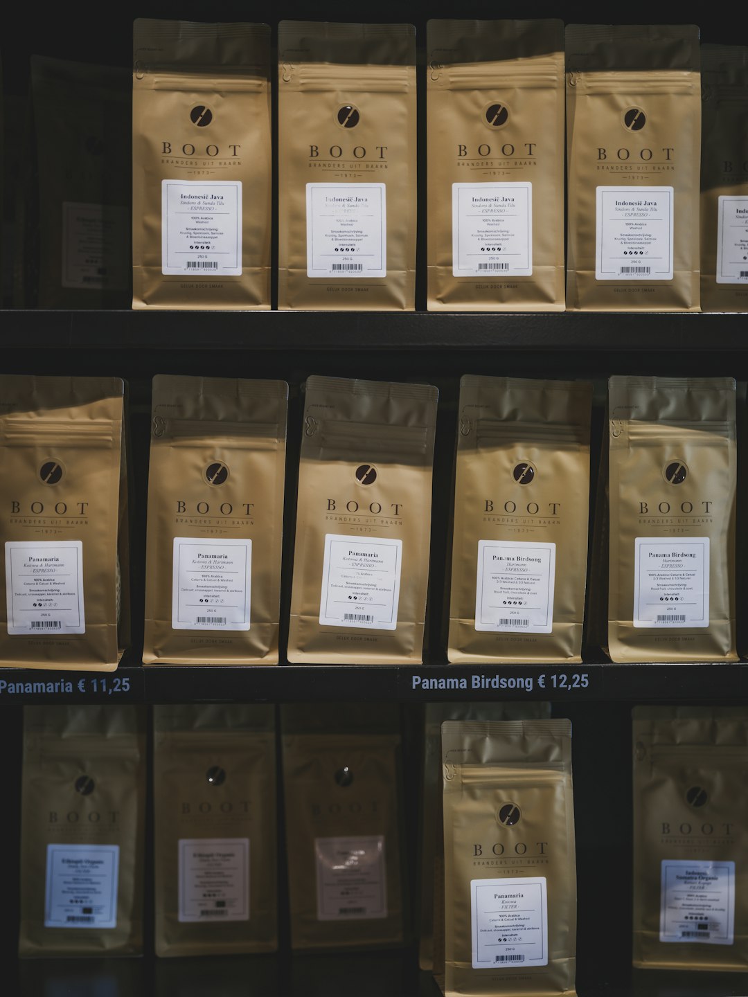 Dark roasted Sumatra coffee beans in packaging